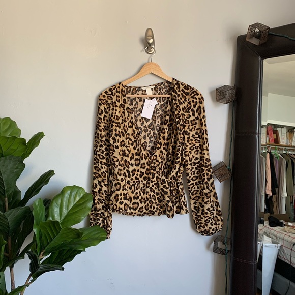 H&M Tops - H&M Cheetah Print Wrap Top size 6